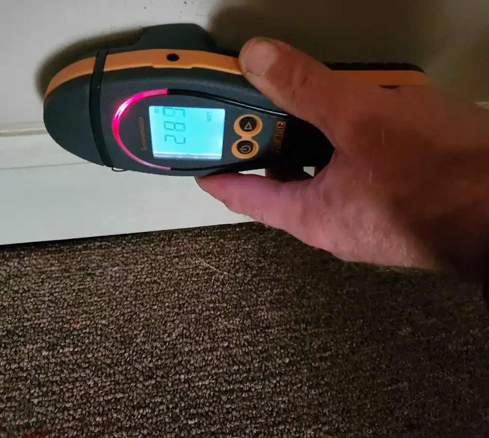 Moisture detection at baseboard during Storm Damage Restoration in Morehead City